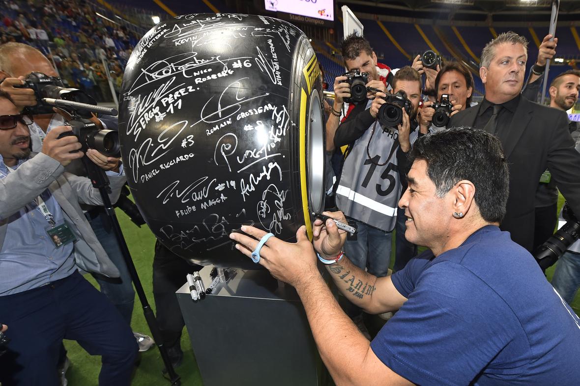Maradona signs Pirelli tyre