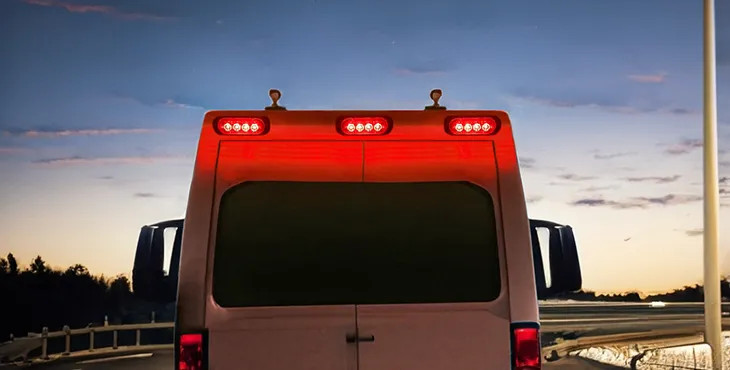 Rear-facing red flashing lamps approved for tyre roadside assistance and recovery workers
